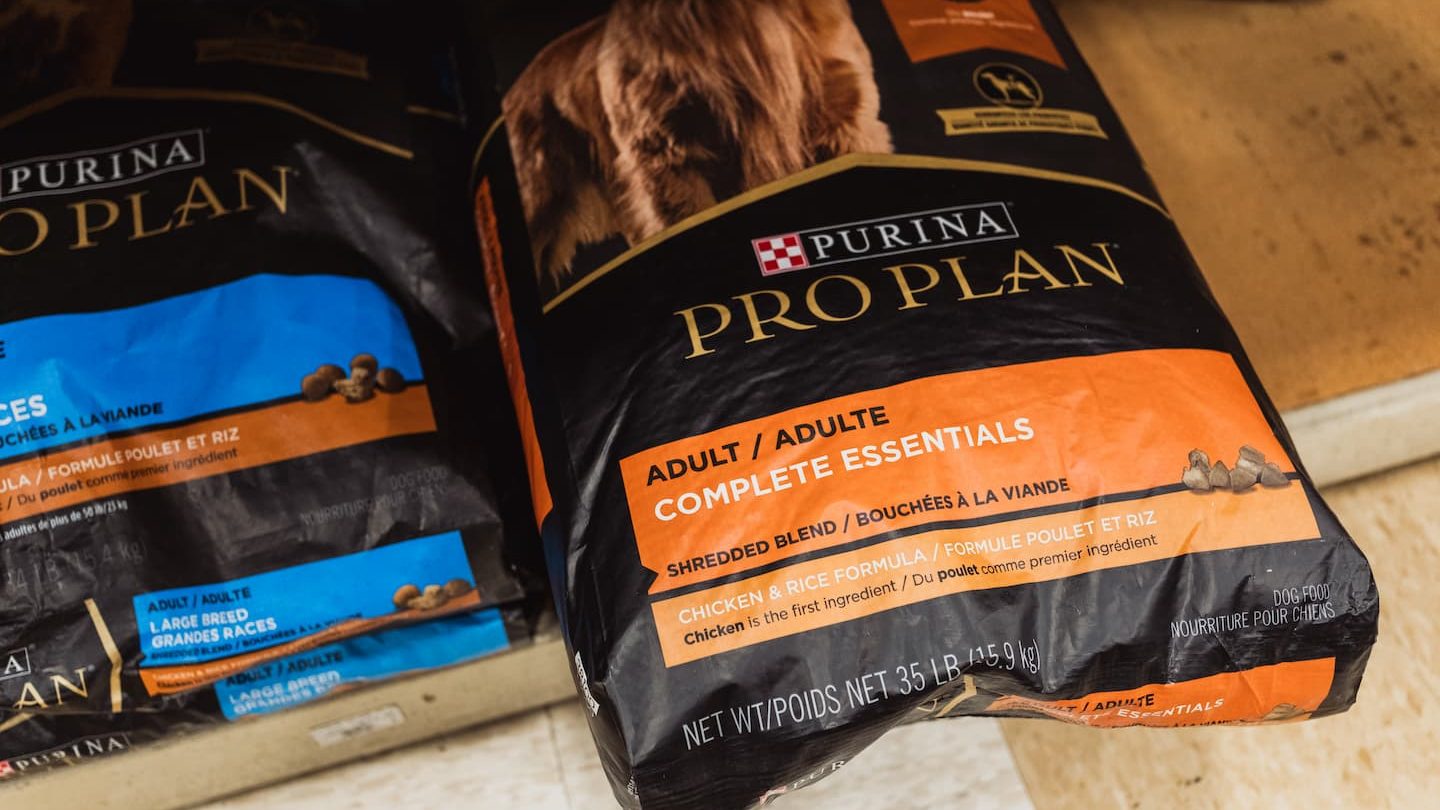 Bag of Purina Pro Plan Adult Complete Essentials Chicken & Rice Formula dog food on display at Anderson’s General Store, offering balanced nutrition for adult dogs.